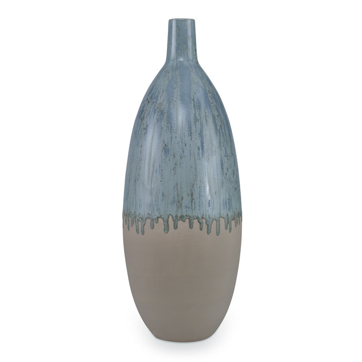 Meda Vase, Large QR-19128.GRNREACT.0 by CuratedKravet CuratedKravet A tall earthenware vase featuring a reactive green glaze. Due to the nature of the glaze, each vase is to be considered unique. Portugal DUST LIGHTLY. </p><p>Dimensions: Length 8.25, Height 21.25, Width 8.25 Ceramic - 100% - Fabric Carolina -