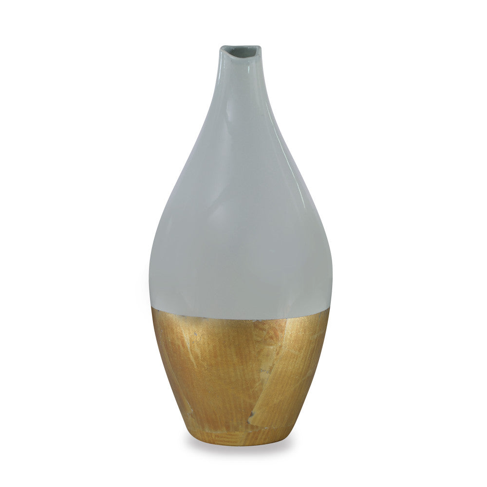 Wigmore Vase QR-19162.LTGRNGOLD.0 by CuratedKravet CuratedKravet A ceramic vase with a finely crafted, balanced shape with a light, celery colored green glaze on the upper portion followed by an opulent gold leaf applied on the lower. Each vase is unique. Made in the USA. This item is decorative and not meant to hold water or foo United States DUST LIGHTLY WITH A SOFT OR SLIGHTLY DAMP LINT-FREE CLOTH. </p><p>Dimensions: Length 8, Height 17, Width 8 Ceramic - 100% - Fabric Carolina -