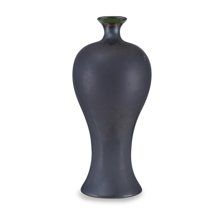 Quarry Vase QR-19168.GRAPHITE.0 by CuratedKravet CuratedKravet A shapely ceramic urn featuring a hand glazed dark gray crystalline finish. Due to the hand glazed process, there may be slight differences as the firing process is unique. This item is decorative and not meant to hold water or food. United States DUST LIGHTLY. </p><p>Dimensions: Length 10, Height 22, Width 10 Ceramic - 100% - Fabric Carolina -