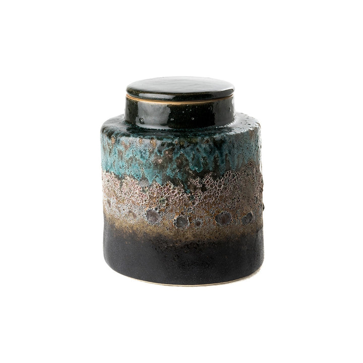 Mack Jar QR-19206.MULTIBLU.0 by CuratedKravet CuratedKravet A stoneware lidded jar featuring a unique blue volcanic finish. Due to the handmade nature of this piece, variation is to be expected. China DUST LIGHTLY. </p><p>Dimensions: Length 5.75, Height 6.25, Width 5.75 Ceramic - 100% - Fabric Carolina -
