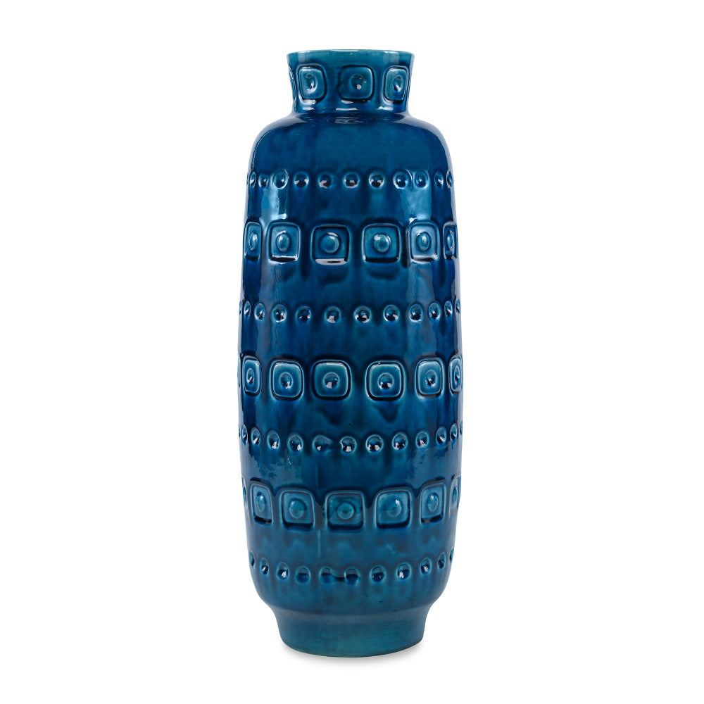 Lita Vase QR-19340.DRKBLUE.0 by CuratedKravet CuratedKravet A decorative earthenware vase with a reactive blue crackled glaze. Each vase is handmade and unique. This vase is not watertight. Portugal DUST LIGHTLY. </p><p>Dimensions: Length 6.5, Height 19, Width 6.5 Ceramic - 100% - Fabric Carolina -