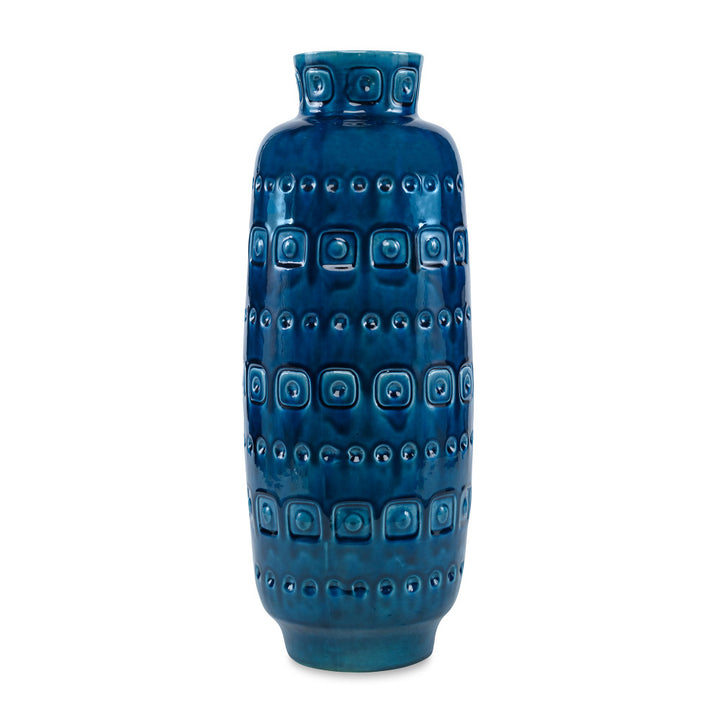 Lita Vase QR-19340.DRKBLUE.0 by CuratedKravet CuratedKravet A decorative earthenware vase with a reactive blue crackled glaze. Each vase is handmade and unique. This vase is not watertight. Portugal DUST LIGHTLY. </p><p>Dimensions: Length 6.5, Height 19, Width 6.5 Ceramic - 100% - Fabric Carolina -