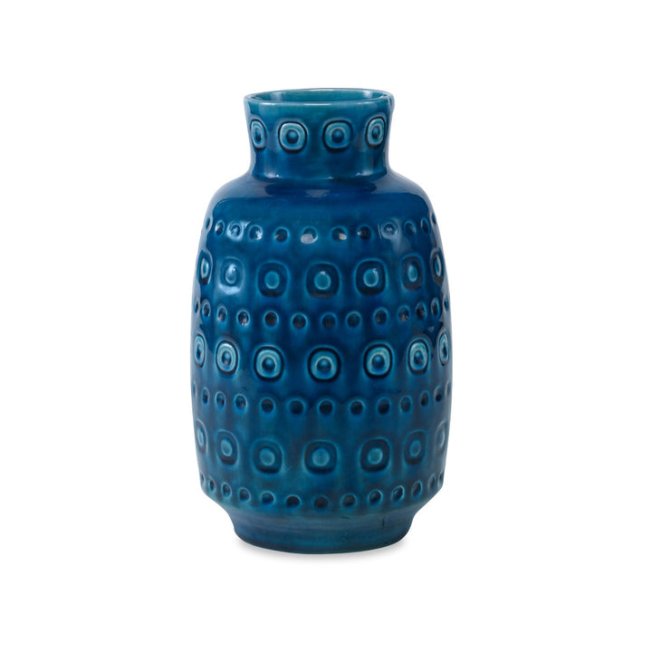 Nita Vase QR-19342.DRKBLUE.0 by CuratedKravet CuratedKravet A decorative earthenware vase with a reactive blue crackled glaze. Each vase is handmade and unique. This vase is not watertight. Portugal DUST LIGHTLY. </p><p>Dimensions: Length 5, Height 9.25, Width 5 Ceramic - 100% - Fabric Carolina -