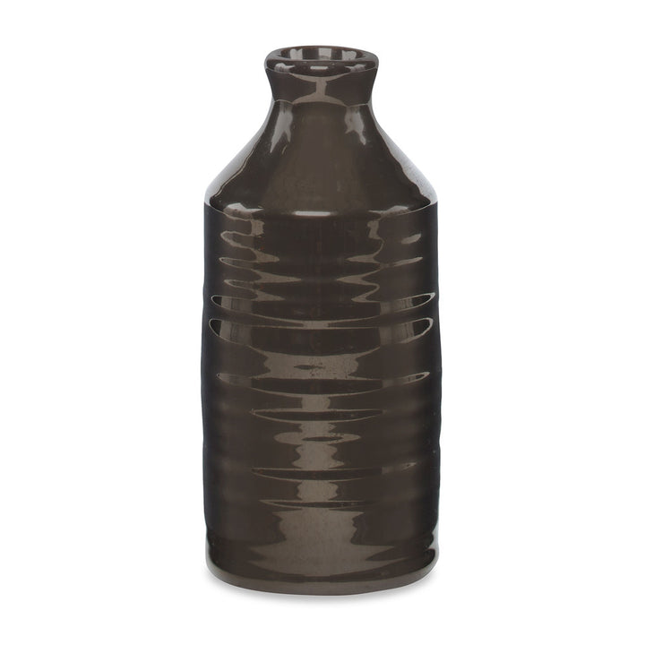 Crossway Vase, Large QR-19368.GOLD.0 by CuratedKravet CuratedKravet A decorative earthenware bottle vase with a reactive gold glaze. Each vase is handmade and unique. This vase is not watertight. Portugal DUST LIGHTLY. </p><p>Dimensions: Length 3.25, Height 8.25, Width 3.25 Ceramic - 100% - Fabric Carolina -