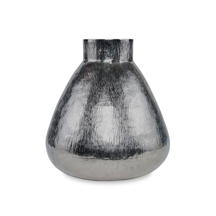 Brasfield Vase QR-19439.NICKEL.0 by CuratedKravet CuratedKravet A shiny nickel colored aluminum vase. India DUST LIGHTLY. </p><p>Dimensions: Length 13.75, Height 14.5, Width 13.25 Aluminum Oxide - 100% - Fabric Carolina -