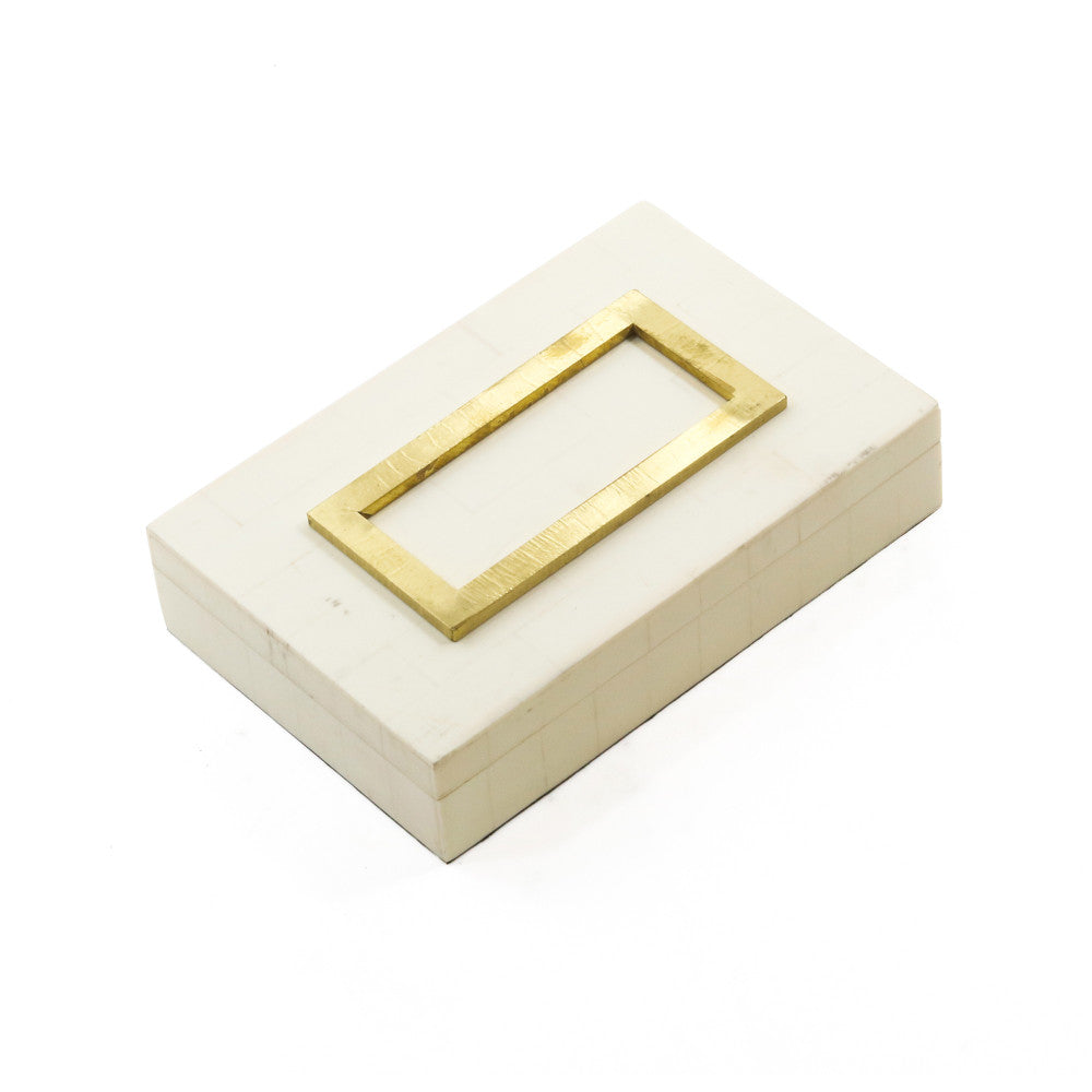 Edith Box QR-20174.IVORY.0 by CuratedKravet CuratedKravet An ivory decorative resin box featuring a raised brass-colored detail on the lid. India DUST LIGHTLY WITH A SOFT, DRY CLOTH. </p><p>Dimensions: Length 9, Height 2, Width 6 Mdf - 50%, Poly Resin - 50% - Fabric Carolina -