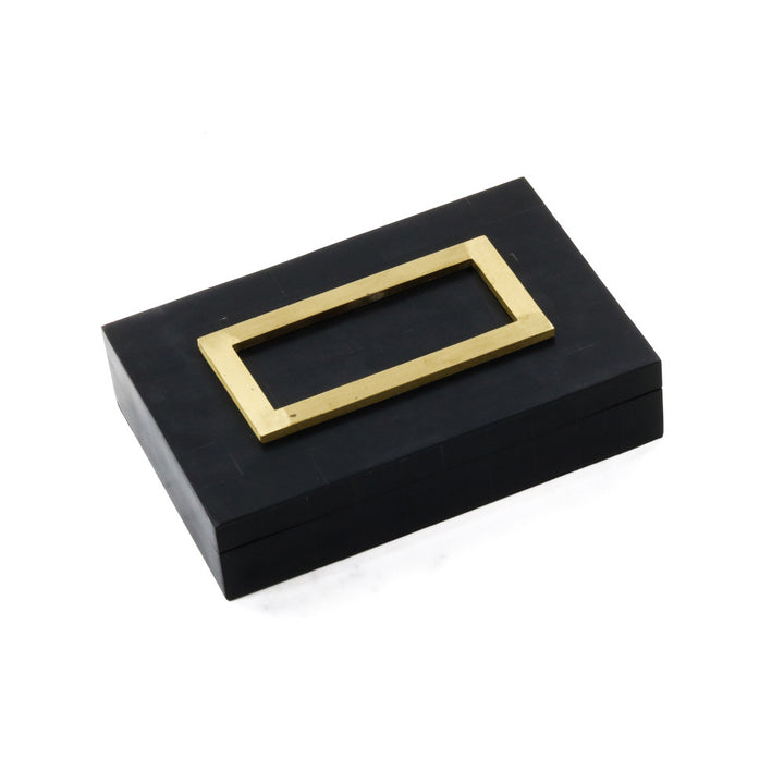 Edith Box QR-20175.BLACK.0 by CuratedKravet CuratedKravet A black decorative resin box featuring a raised brass-colored detail on the lid. India DUST LIGHTLY WITH A SOFT, DRY CLOTH. </p><p>Dimensions: Length 9, Height 2, Width 6 Mdf - 50%, Poly Resin - 50% - Fabric Carolina -