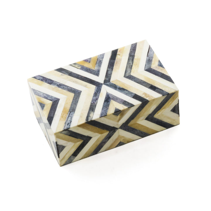 Lottie Box QR-20180.IVRYBRWN.0 by CuratedKravet CuratedKravet An ivory and brown decorative bone box. Features an all over playful triangular pattern. India DUST LIGHTLY WITH A SOFT, DRY CLOTH. </p><p>Dimensions: Length 8, Height 3, Width 5 Bone - 50%, Mdf - 50% - Fabric Carolina -