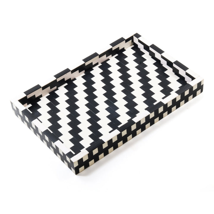 Nannie Tray QR-20183.WHTBLK.0 by CuratedKravet CuratedKravet A white and black decorative resin tray featuring a diagonal stripe pattern. India DUST LIGHTLY WITH A SOFT, DRY CLOTH. </p><p>Dimensions: Length 18, Height 2, Width 12 Mdf - 50%, Poly Resin - 50% - Fabric Carolina -