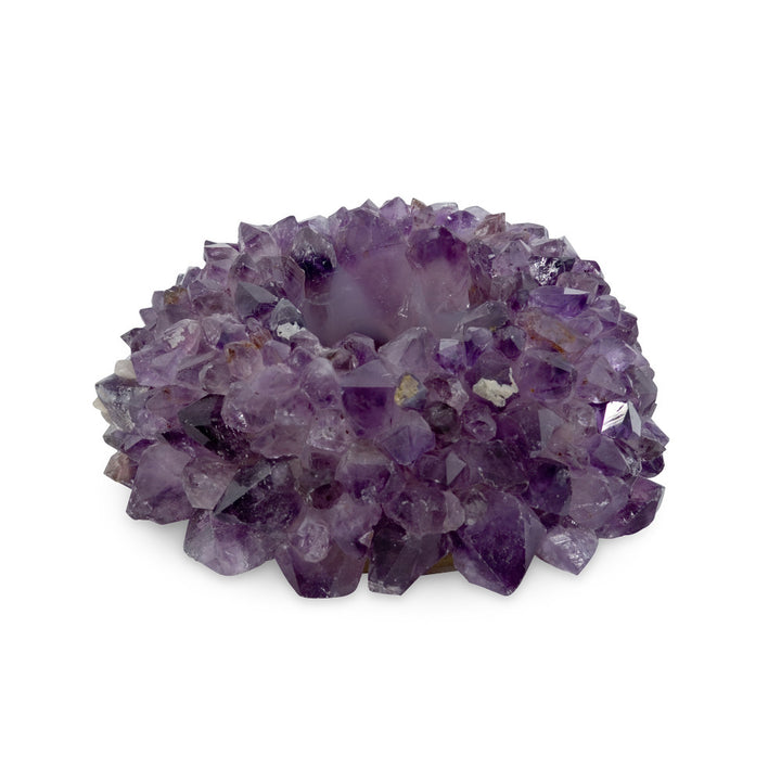 Zia Amethyst Votive, Large QR-20327.PURPLE.0 by CuratedKravet CuratedKravet Candleholder made of points of natural amethyst, drilled with a hole for 2.25 inch diameter candle. Soft felt bottom. Due to the use of natural materials, variation is to be expected. Brazil </p><p>Dimensions: Length 7, Height 3, Width 7 Crystal Stone - 100% - Fabric Carolina -
