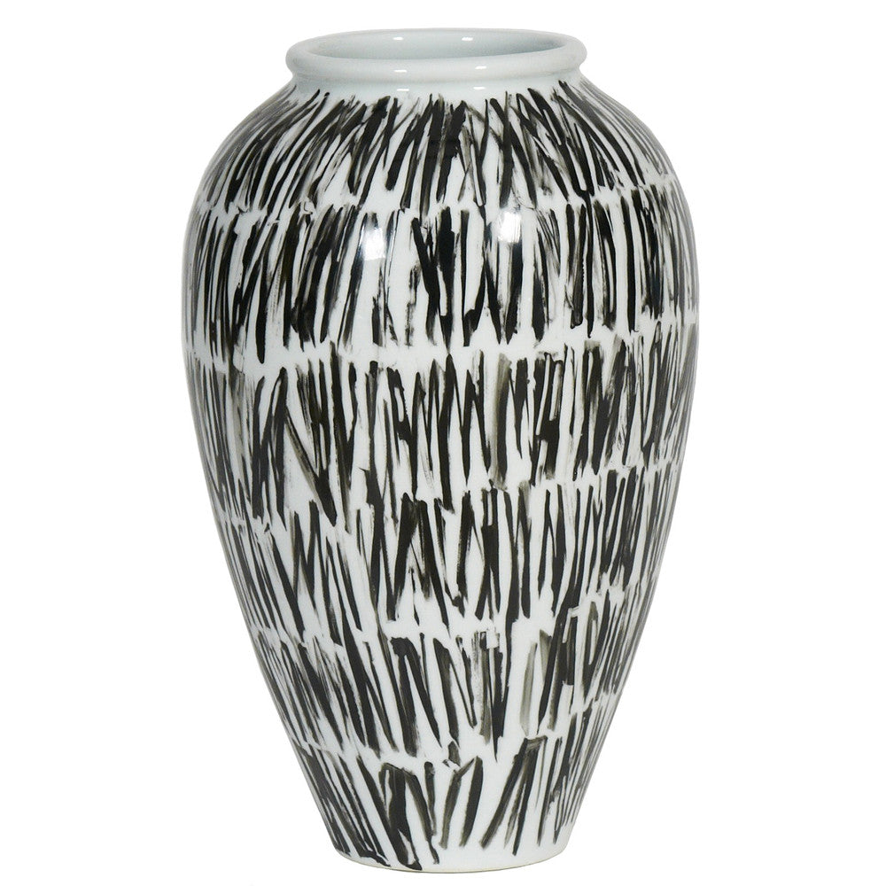 Colette Vase QR-20448.BLKWHT.0 by CuratedKravet CuratedKravet A decorative porcelain vase with an all over black and white pattern. China DUST LIGHTLY WITH A SOFT, DRY CLOTH. </p><p>Dimensions: Length 9.75, Height 15.75, Width 9.75 Porcelain - 100% - Fabric Carolina -
