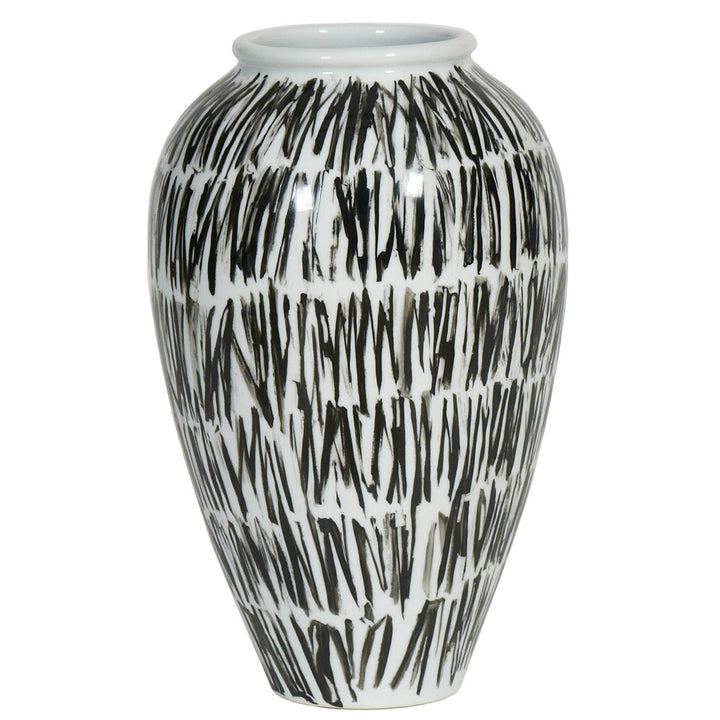 Colette Vase QR-20448.BLKWHT.0 by CuratedKravet CuratedKravet A decorative porcelain vase with an all over black and white pattern. China DUST LIGHTLY WITH A SOFT, DRY CLOTH. </p><p>Dimensions: Length 9.75, Height 15.75, Width 9.75 Porcelain - 100% - Fabric Carolina -