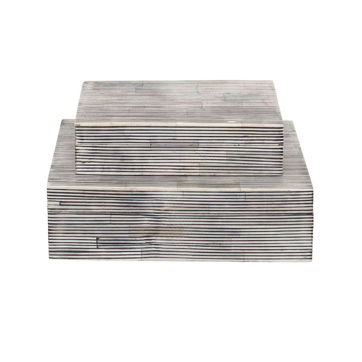 Ran Bone Box, Large QR-20496.BLACKWHITE.0 by CuratedKravet CuratedKravet Lidded box handcrafted and made from genuine bone. Due to the handmade nature of the product, variation is to be expected. India DUST LIGHTLY WITH A SOFT, DRY CLOTH. </p><p>Dimensions: Length 10, Height 3, Width 7 Bone - 90%, Mdf - 10% - Fabric Carolina -