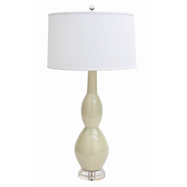 Marilyn Table Lamp QR-20858.SAGECRCKL.0 by CuratedKravet CuratedKravet Part of the Jan Showers for Kravet collection. A unique double gourd ceramic table lamp detailed with a clear acrylic base, topped with an ivory linen shade. United States DUST LIGHTLY WITH A SOFT, DRY CLOTH. </p><p>Dimensions: Length 19, Height 33.5, Width 19 Ceramic - 65%, Linen - 30%, Acrylic - 5% - Fabric Carolina -