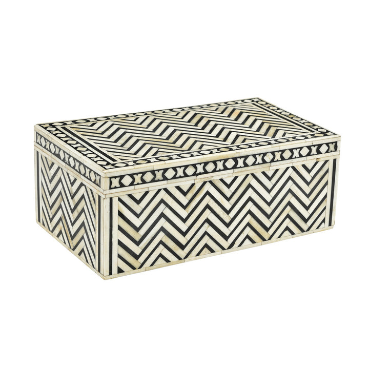 Larkin Bone Box QR-20952.NTRLBLK.0 by CuratedKravet CuratedKravet An oversized wood and bone lidded box featuring an intricate inlaid pattern. Due to the natural material and handmade nature of this box, variation is to be expected. India Dust lightly with a soft, dry cloth. </p><p>Dimensions: Length 14, Height 5.5, Width 8 Bone - 50%, Wood - 50% - Fabric Carolina -