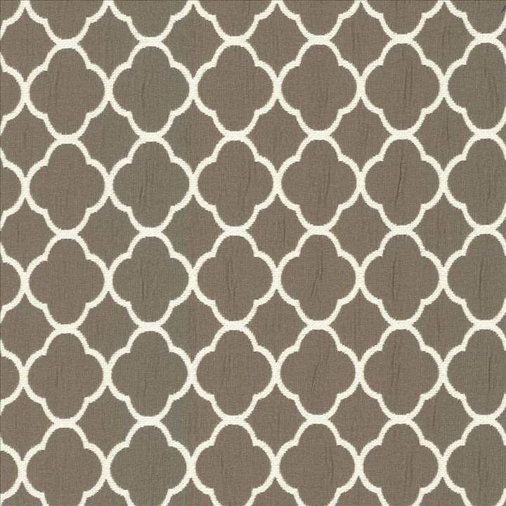 Quatrefoil Maze Patina by Kasmir Fabric 5085 70% Cotton
30% Polyester
 CHINA 6,500 Wyzenbeek Double Rubs </p><p>Repeat: Horizontal: 1 6/8 inches and Vertical: 1 6/8 inches 54 - Fabric Carolina -