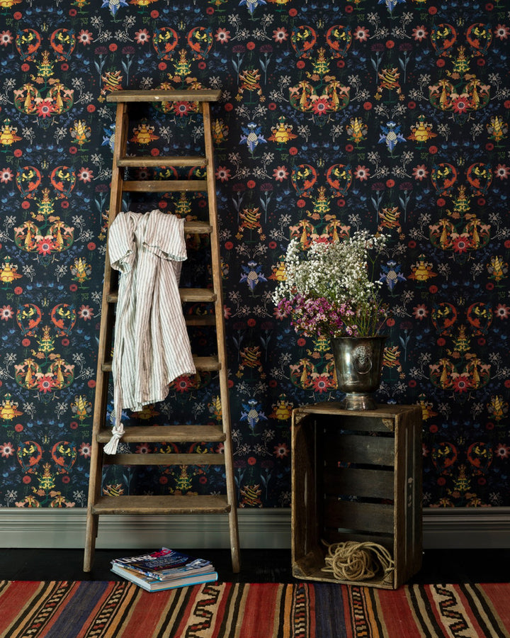TRANSYLVANIA FOLK in Blue Wallpaper (WP20312) by Mind The Gap | WP20312 | THE WALLPAPER COLLECTABLES | 3 rolls x 20.5 x 118.1 in | 0.52m / 20.5in | 3m / 118in | 4.65mp | 52cm / 20.5in | Blue, Red, Yellow | Textured Matte | Paste the wall | 3-rolls in a box | Fabric Carolina | https://www.fabriccarolina.com/